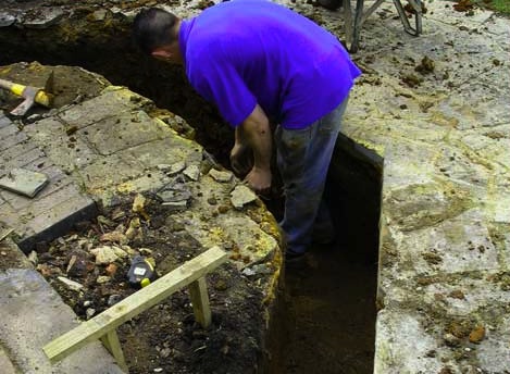 Digging the conservatory footings Our builder in the footings